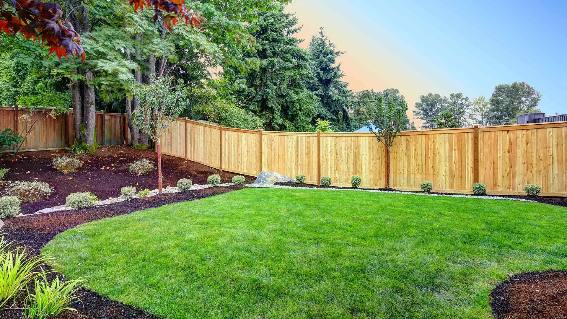 Lawn and landscaping in Sauk Rapids, MN that receives routine maintenance and care services.