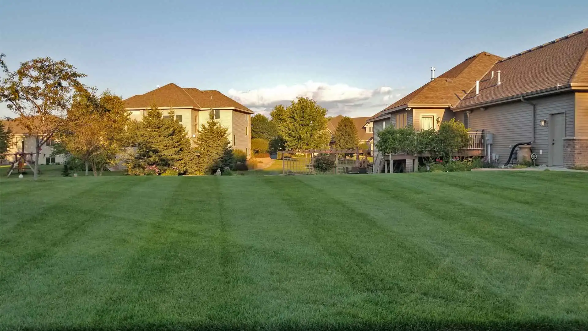 Home in Sartell, MN after professional mowing.