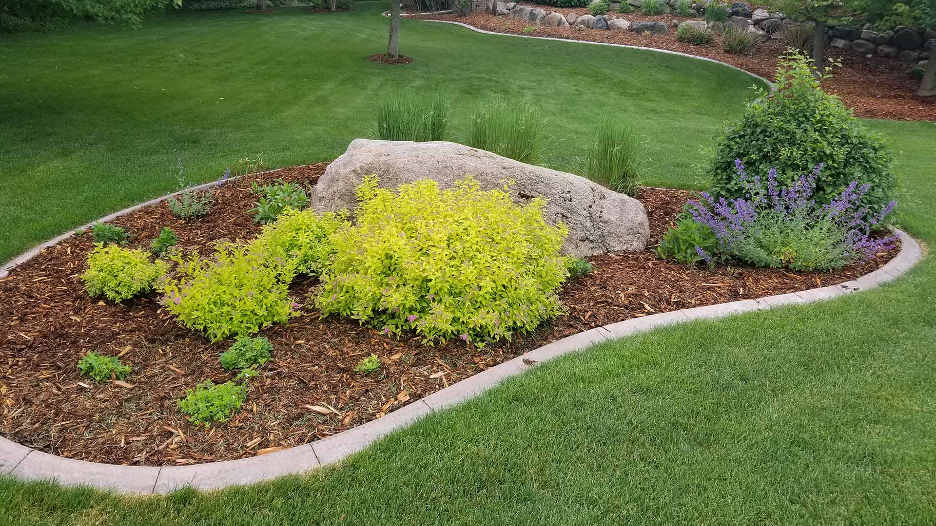 Mulch installation at a home in St. Cloud, MN.