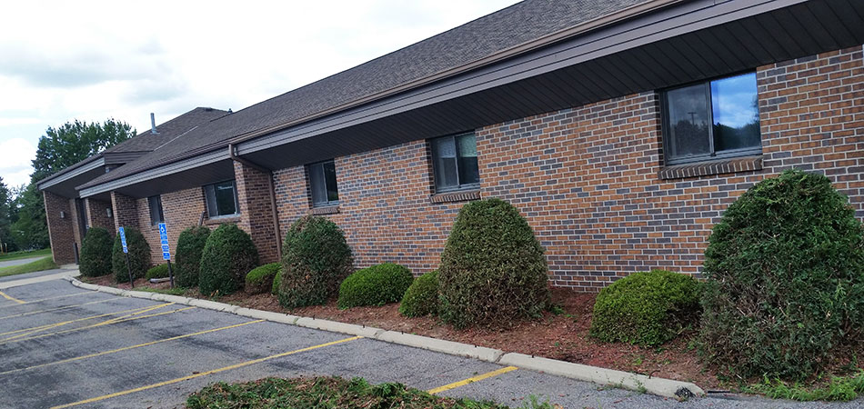 Recently trimmed shrubs in front of a business in Sauk Rapids.