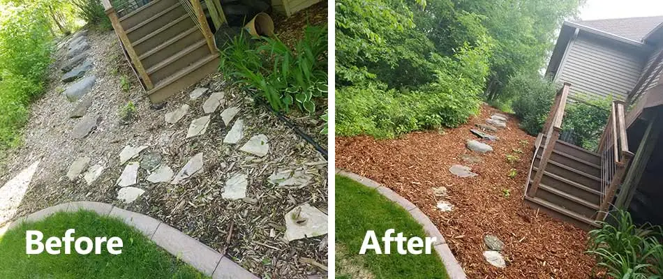 Mulch installation around a home's stairs near Waite Park, MN.